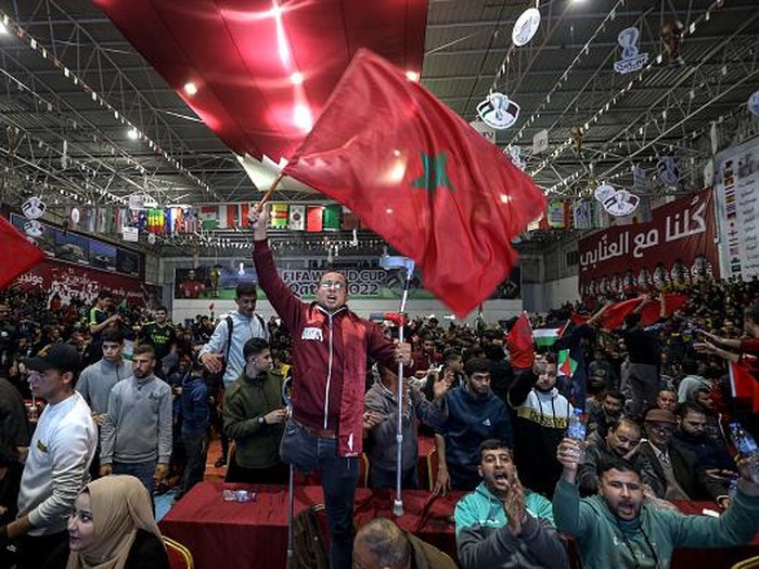 Palestinians fans watch the match between Morocco and Spain during the Qatar 2022 World Cup football in Gaza City, on December 6,2022. (Photo by Sameh Rahmi/NurPhoto via Getty Images)