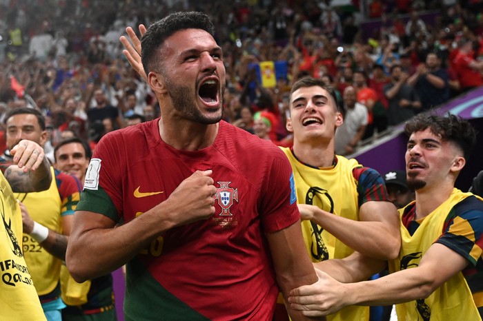 Portugal's forward #26 Goncalo Ramos celebrates after he scored his team's first goal during the Qatar 2022 World Cup round of 16 football match between Portugal and Switzerland at Lusail Stadium in Lusail, north of Doha on December 6, 2022. (Photo by PATRICIA DE MELO MOREIRA / AFP) (Photo by PATRICIA DE MELO MOREIRA/AFP via Getty Images)