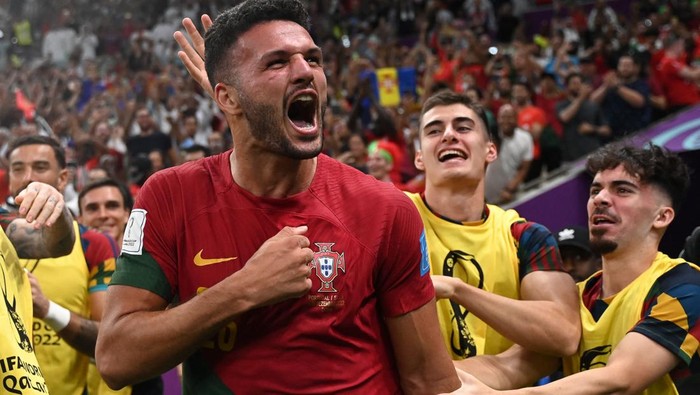 Portugals forward #26 Goncalo Ramos celebrates after he scored his teams first goal during the Qatar 2022 World Cup round of 16 football match between Portugal and Switzerland at Lusail Stadium in Lusail, north of Doha on December 6, 2022. (Photo by PATRICIA DE MELO MOREIRA / AFP) (Photo by PATRICIA DE MELO MOREIRA/AFP via Getty Images)