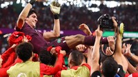 Berkat tepisan Yassine Bounou, Maroko akhirnya menang telak 3-0 dan berhak melaju ke babak perempat final. (Alex Livesey/Getty Images).