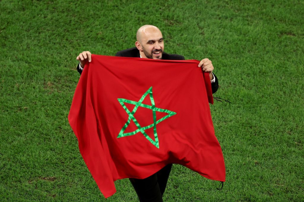 AL RAYYAN, QATAR - DECEMBER 06: Walid Regragui, Head Coach of Morocco, celebrates after the team's victory in the penalty shoot out during the FIFA World Cup Qatar 2022 Round of 16 match between Morocco and Spain at Education City Stadium on December 06, 2022 in Al Rayyan, Qatar. (Photo by Alexander Hassenstein/Getty Images)