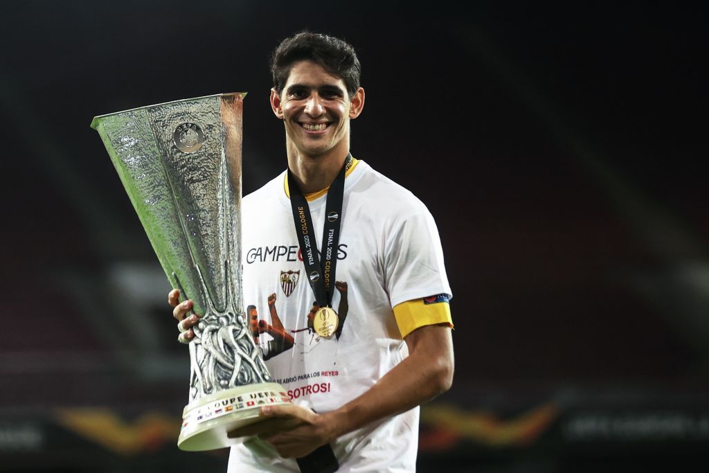 Sevilla's Moroccan goalkeeper Yassine Bounou holds the trophy after winning the UEFA Europa League final football match Sevilla v Inter Milan on August 21, 2020, in Cologne, western Germany. (Photo by Lars Baron / POOL / AFP) (Photo by LARS BARON/POOL/AFP via Getty Images)