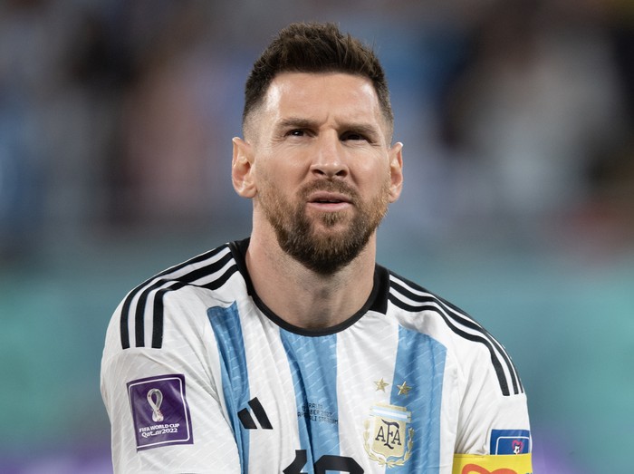 Lionel Messi DOHA, QATAR - DECEMBER 03: Lionel Messi of Argentina lines up before the FIFA World Cup Qatar 2022 Round of 16 match between Argentina and Australia at Ahmad Bin Ali Stadium on December 3, 2022 in Doha, Qatar. (Photo by Visionhaus/Getty Images)