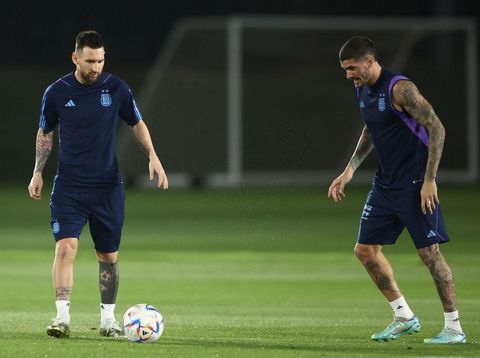 DOHA, QATAR - DECEMBER 08: Lionel Messi and Rodrigo De Paul of Argentina are seen during a training session on match day -1 at Qatar University on December 08, 2022 in Doha, Qatar. (Photo by Robert Cianflone/Getty Images)