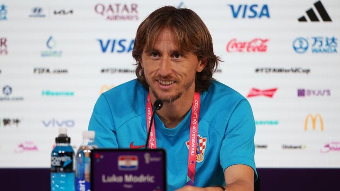 DOHA, QATAR - DECEMBER 08: Luka Modric of Croatia speaks during a press conference on match day -1 at the Main Media Center on December 08, 2022 in Doha, Qatar. (Photo by Cathrin Mueller - FIFA/FIFA via Getty Images)
