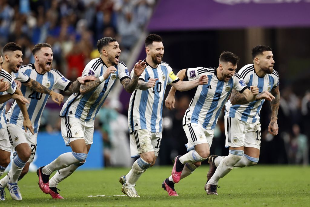 AL DAAYEN - (lr) Alexis Mac Allister of Argentina, Gonzalo Montiel of Argentina, Lionel Messi of Argentina, Nicolas Tagliafico of Argentina, Nicolas Otamendi of Argentina celebrate victory after the FIFA World Cup Qatar 2022 quarterfinal match between the Netherlands and Argentina in the Lusail Stadium on December 9, 2022 in Al Daayen, Qatar. ANP MAURICE VAN STONE (Photo by ANP via Getty Images)