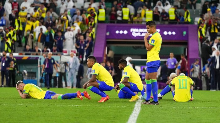 Brazils team react after they lost in the penalties shootout in the World Cup quarterfinal soccer match between Croatia and Brazil, at the Education City Stadium in Al Rayyan, Qatar, Friday, Dec. 9, 2022. (AP Photo/Frank Augstein)
