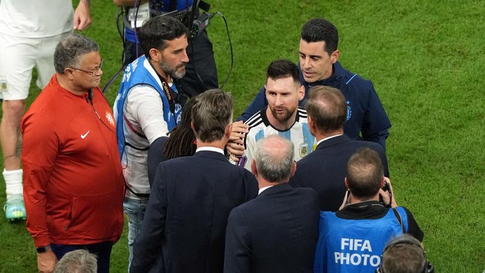 Argentinas Lionel Messi with Netherlands manager Louis van Gaal following the FIFA World Cup Quarter-Final match at the Lusail Stadium in Lusail, Qatar. Picture date: Friday December 9, 2022. (Photo by Peter Byrne/PA Images via Getty Images)