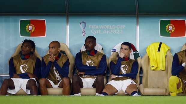 Soccer Football - FIFA World Cup Qatar 2022 - Quarter Final - Morocco v Portugal - Al Thumama Stadium, Doha, Qatar - December 10, 2022 Portugal's Cristiano Ronaldo on the substitutes bench REUTERS/Suhaib Salem