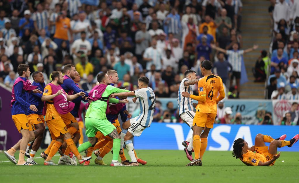 LUSAIL CITY, QATAR - DECEMBER 09: Virgil Van Dijk of Netherlands clashes with Leandro Paredes of Argentina during the FIFA World Cup Qatar 2022 quarter final match between Netherlands and Argentina at Lusail Stadium on December 09, 2022 in Lusail City, Qatar. (Photo by Clive Brunskill/Getty Images)