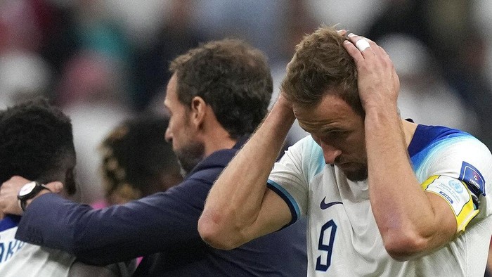 Englands Harry Kane reacts after the World Cup quarterfinal soccer match between England and France, at the Al Bayt Stadium in Al Khor, Qatar, Sunday, Dec. 11, 2022. (AP Photo/Frank Augstein)