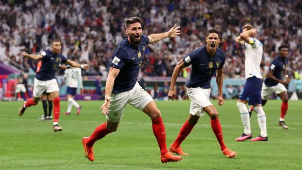 AL KHOR, QATAR - DECEMBER 10: Olivier Giroud of France celebrates after scoring the team's second goal during the FIFA World Cup Qatar 2022 quarter final match between England and France at Al Bayt Stadium on December 10, 2022 in Al Khor, Qatar. (Photo by Catherine Ivill/Getty Images)