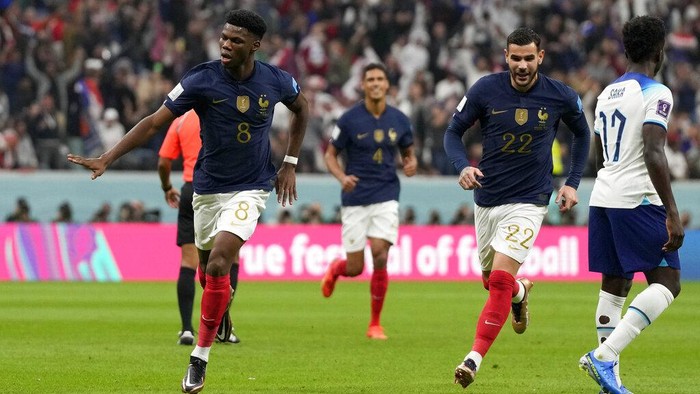 Frances Aurelien Tchouameni celebrates after scoring his sides opening goal during the World Cup quarterfinal soccer match between England and France, at the Al Bayt Stadium in Al Khor, Qatar, Saturday, Dec. 10, 2022. (AP Photo/Frank Augstein)