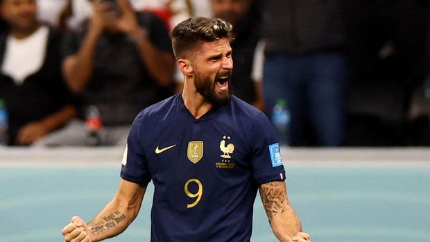 SOCCER-WORLDCUP-ENG-FRA/REPORT Soccer Football - FIFA World Cup Qatar 2022 - Quarter Final - England v France - Al Bayt Stadium, Al Khor, Qatar - December 10, 2022 France's Olivier Giroud celebrates scoring their second goal REUTERS/Hannah Mckay