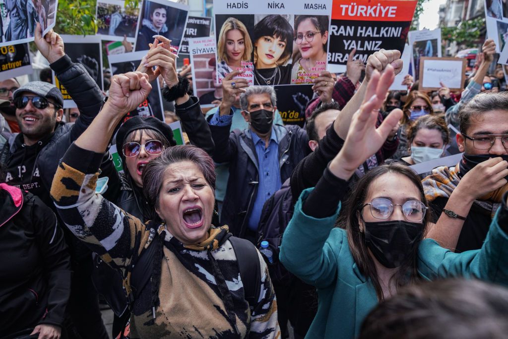 ISTANBUL, TURKEY - OCTOBER 17: Demonstrators gather to protest over the death of Iranian Mahsa Amini outside the Iranian Consulate on October 17, 2022 in Istanbul, Turkey. Mahsa Amini fell into a coma and died after being arrested in Tehran by the morality police, for allegedly violating the countries hijab rules. Amini's death has sparked weeks of violent protests across Iran. (Photo by Cemal Yurttas/ dia images via Getty Images)