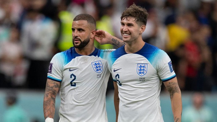 AL KHOR, QATAR - DECEMBER 04: Kyle Walker and John Stones of England during the FIFA World Cup Qatar 2022 Round of 16 match between England and Senegal at Al Bayt Stadium on December 4, 2022 in Al Khor, Qatar. (Photo by Visionhaus/Getty Images)