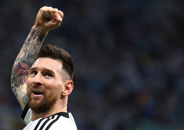 Soccer Football - FIFA World Cup Qatar 2022 - Quarter Final - Netherlands v Argentina - Lusail Stadium, Lusail, Qatar - December 9, 2022 Argentinas Lionel Messi celebrates after Nahuel Molina scores their first goal REUTERS/Kai Pfaffenbach     TPX IMAGES OF THE DAY