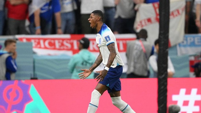 Englands forward #11 Marcus Rashford reacts to missing a free-kick during the Qatar 2022 World Cup quarter-final football match between England and France at the Al-Bayt Stadium in Al Khor, north of Doha, on December 10, 2022. (Photo by FRANCK FIFE / AFP) (Photo by FRANCK FIFE/AFP via Getty Images)