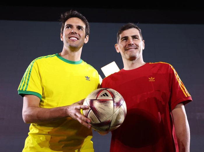 DOHA, QATAR - DECEMBER 11: FIFA Legends Kaka (L) of Brazil and Iker Casillas of Spain pose with the adidas Official Finals Match Ball ‘Al Hilm’ during the adidas Match Ball Unveiling at Al Bidda Park on December 11, 2022 in Doha, Qatar. (Photo by Katelyn Mulcahy - FIFA/FIFA via Getty Images)
