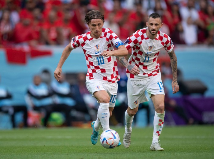 AL KHOR, QATAR - NOVEMBER 23: Luka Modric and Marcelo Brozovic of Croatia in action during the FIFA World Cup Qatar 2022 Group F match between Morocco and Croatia at Al Bayt Stadium on November 23, 2022 in Al Khor, Qatar. (Photo by Visionhaus/Getty Images)