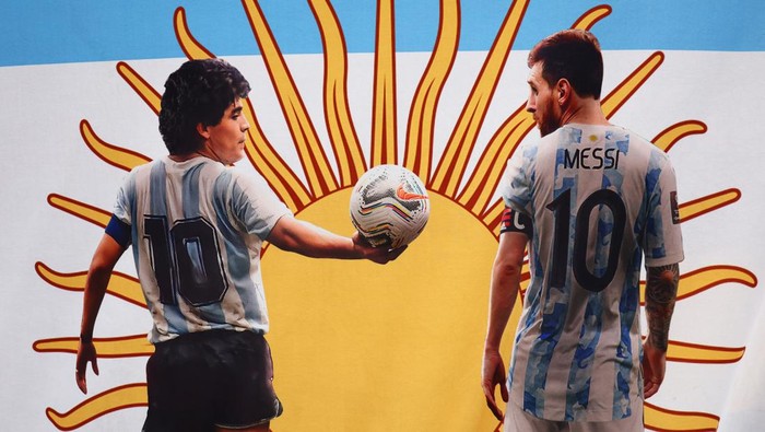 Diego Maradona LUSAIL CITY, QATAR - DECEMBER 09: General View of a banner showing Diego Maradona & Lionel Messi of Argentina prior to the FIFA World Cup Qatar 2022 quarter final match between Netherlands and Argentina at Lusail Stadium on December 9, 2022 in Lusail City, Qatar. (Photo by Chris Brunskill/Fantasista/Getty Images)