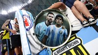 Gambar Diego Maradona bersama Lionel Messi turut tercetak di drum yang dibawa fans Argentina. (Foto: Getty Images/Chris Brunskill/Fantasista)