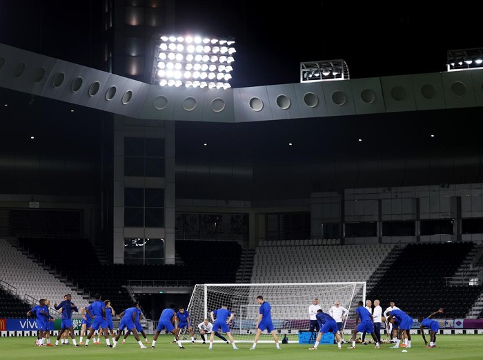 DOHA, QATAR - DECEMBER 13: Player of France stretches during the France Training Session at Al Sadd SC on December 13, 2022 in Doha, Qatar. (Photo by Mohamed Farag/Getty Images)