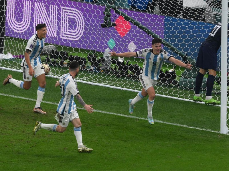 Argentina's forward #09 Julian Alvarez celebrates scoring his team's second goal during the Qatar 2022 World Cup football semi-final match between Argentina and Croatia at Lusail Stadium in Lusail, north of Doha on December 13, 2022. (Photo by Paul ELLIS / AFP) (Photo by PAUL ELLIS/AFP via Getty Images)