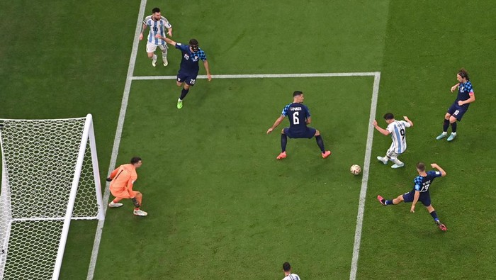 Julian Alvarez Argentina's forward #09 Julian Alvarez (3R) scores his team's third goal during the Qatar 2022 World Cup football semi-final match between Argentina and Croatia at Lusail Stadium in Lusail, north of Doha on December 13, 2022. (Photo by Anne-Christine POUJOULAT / AFP) (Photo by ANNE-CHRISTINE POUJOULAT/AFP via Getty Images)