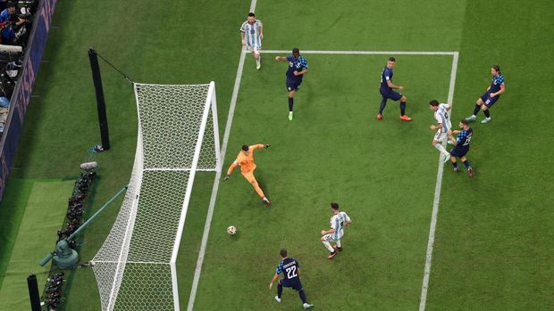 LUSAIL CITY, QATAR - DECEMBER 13: (EDITORS NOTE: In this photo taken from a remote camera from above the pitch) Julian Alvarez of Argentina scores the team's third goal past Dominik Livakovic of Croatia during the FIFA World Cup Qatar 2022 semi final match between Argentina and Croatia at Lusail Stadium on December 13, 2022 in Lusail City, Qatar. (Photo by Clive Brunskill/Getty Images)