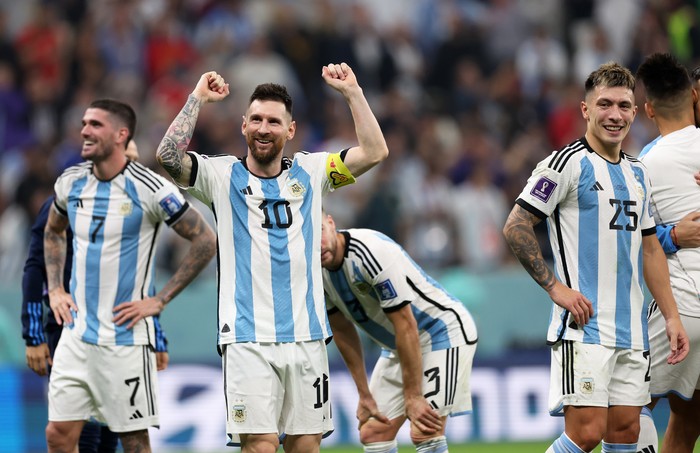 LUSAIL CITY, QATAR - DECEMBER 13:  Lionel Messi of Argentina celebrates the teams 3-0 victory in the FIFA World Cup Qatar 2022 semi final match between Argentina and Croatia at Lusail Stadium on December 13, 2022 in Lusail City, Qatar. (Photo by Clive Brunskill/Getty Images)