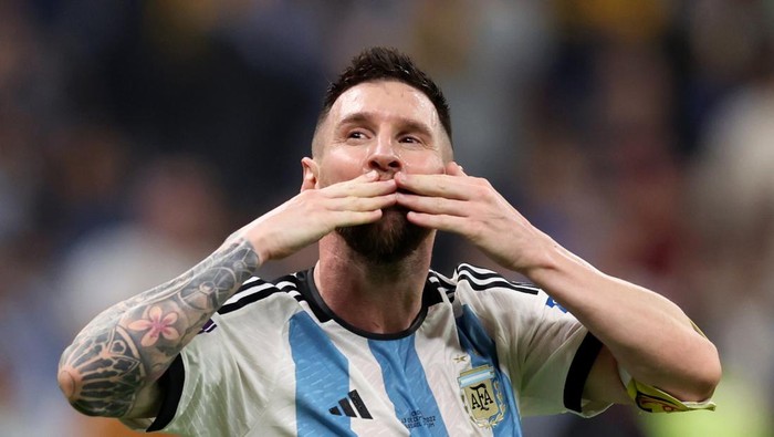 LUSAIL CITY, QATAR - DECEMBER 13: Lionel Messi celebrates after their sides third goal by Julian Alvarez of Argentina (not pictured) during the FIFA World Cup Qatar 2022 semi final match between Argentina and Croatia at Lusail Stadium on December 13, 2022 in Lusail City, Qatar. (Photo by Clive Brunskill/Getty Images)