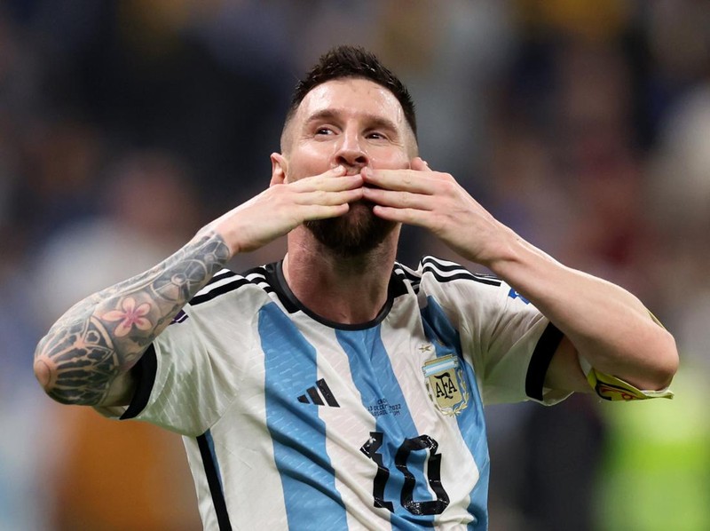 LUSAIL CITY, QATAR - DECEMBER 13: Lionel Messi celebrates after their sides third goal by Julian Alvarez of Argentina (not pictured) during the FIFA World Cup Qatar 2022 semi final match between Argentina and Croatia at Lusail Stadium on December 13, 2022 in Lusail City, Qatar. (Photo by Clive Brunskill/Getty Images)