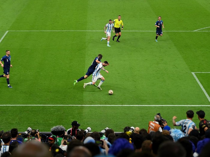 LUSAIL CITY, QATAR - DECEMBER 13: Lionel Messi of Argentina controls the ball against Josko Gvardiol of Croatia during the FIFA World Cup Qatar 2022 semi final match between Argentina and Croatia at Lusail Stadium on December 13, 2022 in Lusail City, Qatar. (Photo by David Ramos - FIFA/FIFA via Getty Images)