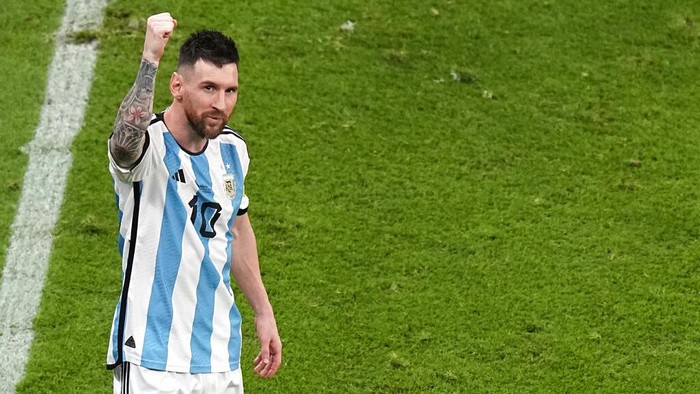 Argentinas Lionel Messi celebrates at the end of the World Cup semifinal soccer match between Argentina and Croatia at the Lusail Stadium in Lusail, Qatar, Tuesday, Dec. 13, 2022. (AP Photo/Pavel Golovkin)