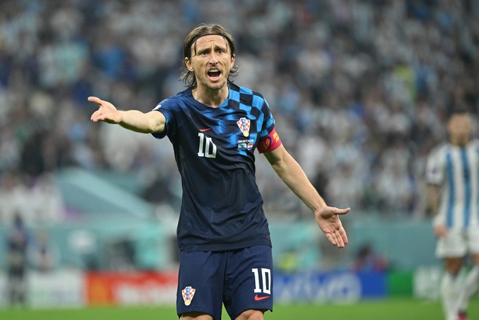 LUSAIL CITY, QATAR - DECEMBER 13: Luka Modric of Croatia reacts during the FIFA World Cup Qatar 2022 semi final match between Argentina and Croatia at Lusail Stadium on December 13, 2022 in Lusail City, Qatar. (Photo by Lionel Hahn/Getty Images)