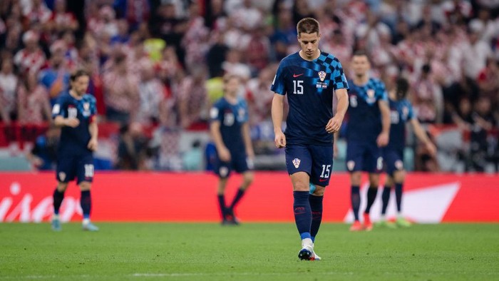 LUSAIL CITY, QATAR - DECEMBER 13: Mario Pasalic of Croatia looks dejected during the FIFA World Cup Qatar 2022 semi final match between Argentina and Croatia at Lusail Stadium on December 13, 2022 in Lusail City, Qatar. (Photo by Markus Gilliar - GES Sportfoto/Getty Images)