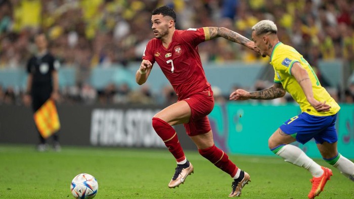 DOHA, QATAR - NOVEMBER 24: Nemanja Radonji #7 of Serbia dribbles the ball during a FIFA World Cup Qatar 2022 Group G match between Serbia and Brazil at Lusail Stadium on November 24, 2022 in Doha, Qatar. (Photo by John Todd/ISI Photos/Getty Images)