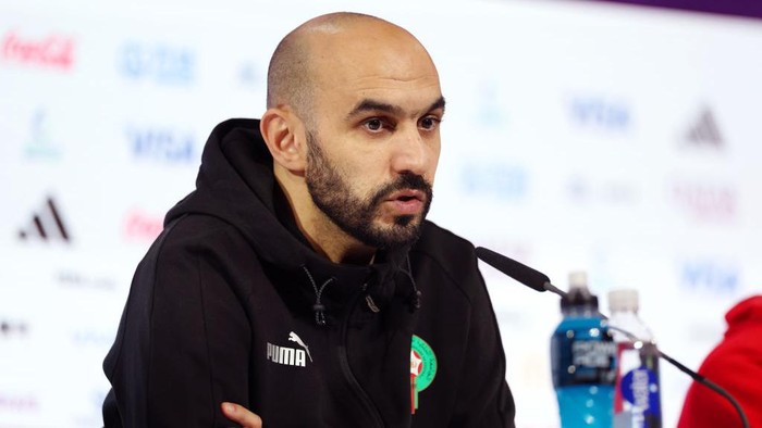 DOHA, QATAR - DECEMBER 13: Walid Regragui, Head Coach of Morocco, speaks during the Morocco Press Conference at the Main Media Center on December 13, 2022 in Doha, Qatar. (Photo by Maja Hitij - FIFA/FIFA via Getty Images)