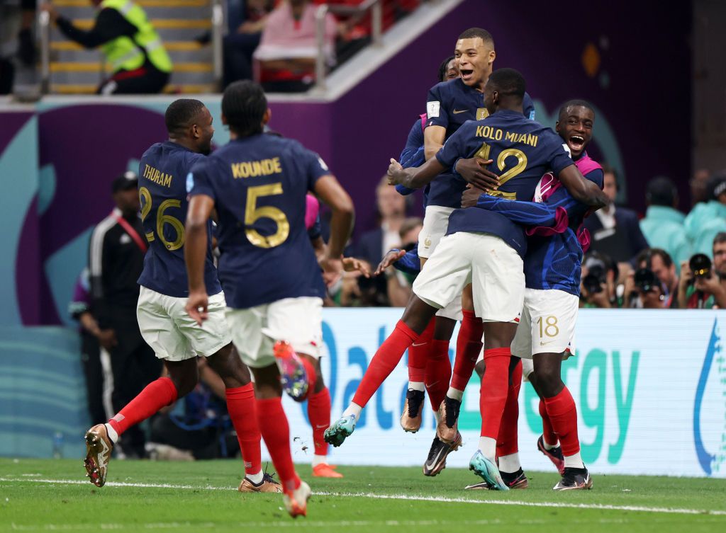 AL KHOR, QATAR - DECEMBER 14: Randal Kolo Muani of France celebrates with teammates after scoring the team's second goal during the FIFA World Cup Qatar 2022 semi final match between France and Morocco at Al Bayt Stadium on December 14, 2022 in Al Khor, Qatar. (Photo by Catherine Ivill/Getty Images)