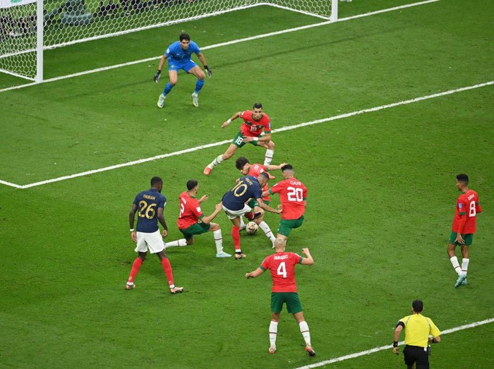 AL KHOR, QATAR - DECEMBER 14: Kylian Mbappe of France shoots leading to the France's second goal scored by Randal Kolo Muani (not pictured) during the FIFA World Cup Qatar 2022 semi final match between France and Morocco at Al Bayt Stadium on December 14, 2022 in Al Khor, Qatar. (Photo by Matthias Hangst/Getty Images)