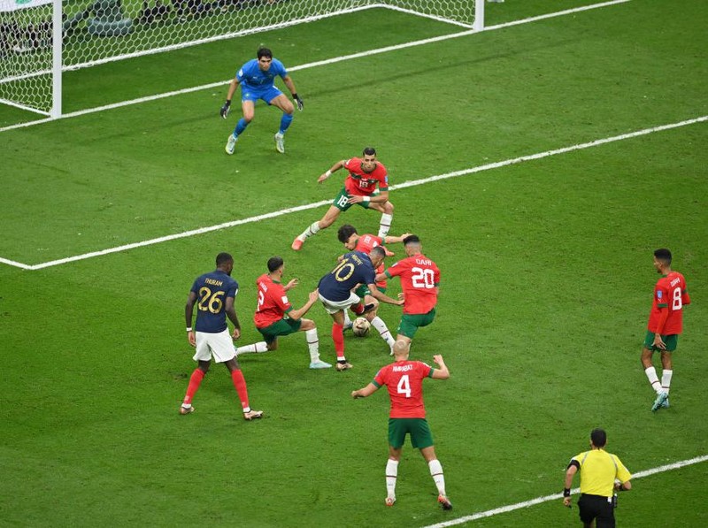AL KHOR, QATAR - DECEMBER 14: Kylian Mbappe of France shoots leading to the France's second goal scored by Randal Kolo Muani (not pictured) during the FIFA World Cup Qatar 2022 semi final match between France and Morocco at Al Bayt Stadium on December 14, 2022 in Al Khor, Qatar. (Photo by Matthias Hangst/Getty Images)