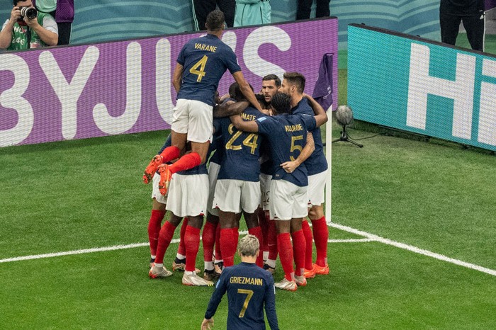 AL KHOR, QATAR - DECEMBER 14: Theo Hernandez of France (C) celebrating the opening goal of France with his teammates during the FIFA World Cup Qatar 2022 semi final match between France and Morocco at Al Bayt Stadium on December 14, 2022 in Al Khor, Qatar. (Photo by Eurasia Sport Images/Getty Images)
