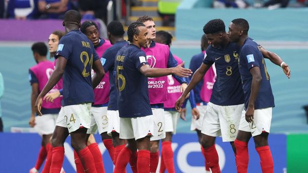 AL KHOR, QATAR - DECEMBER 14: Randal Kolo Muani of France celebrates with teammates after scoring his side's second goal during the FIFA World Cup Qatar 2022 semi final match between France and Morocco at Al Bayt Stadium on December 14, 2022 in Al Khor, Qatar. (Photo by Alex Livesey - Danehouse/Getty Images)