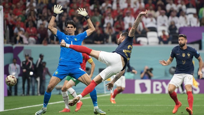 AL KHOR, QATAR - DECEMBER 14: Theo Hernandez of France scores the opening goal past Yassine Bounou of Morocco during the FIFA World Cup Qatar 2022 semi final match between France and Morocco at Al Bayt Stadium on December 14, 2022 in Al Khor, Qatar. (Photo by Sebastian Frej/MB Media/Getty Images)