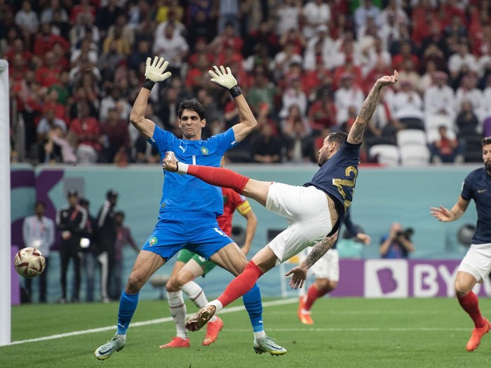 AL KHOR, QATAR - DECEMBER 14: Theo Hernandez of France scores the opening goal past Yassine Bounou of Morocco during the FIFA World Cup Qatar 2022 semi final match between France and Morocco at Al Bayt Stadium on December 14, 2022 in Al Khor, Qatar. (Photo by Sebastian Frej/MB Media/Getty Images)