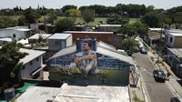 Selama gelaran Piala Dunia, mural Messi menghiasi banyak bangunan di Argentina.  