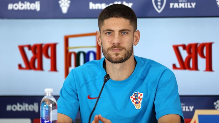 DOHA, QATAR - DECEMBER 15: Andrej Kramaric of Croatia speaks during the Croatia Press Conference at Al Erssal Training Site on December 15, 2022 in Doha, Qatar. (Photo by Mohamed Farag/Getty Images,)