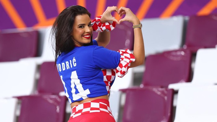 Ivana Knoll 17 December 2022, Qatar, Al-Rajjan: Soccer, World Cup 2022 in Qatar, Croatia - Morocco, third place match, at Chalifa International Stadium, Ivana KnΓΆll, model from Croatia, gestures in the stands before the match. Photo: Tom Weller/dpa (Photo by Tom Weller/picture alliance via Getty Images)
