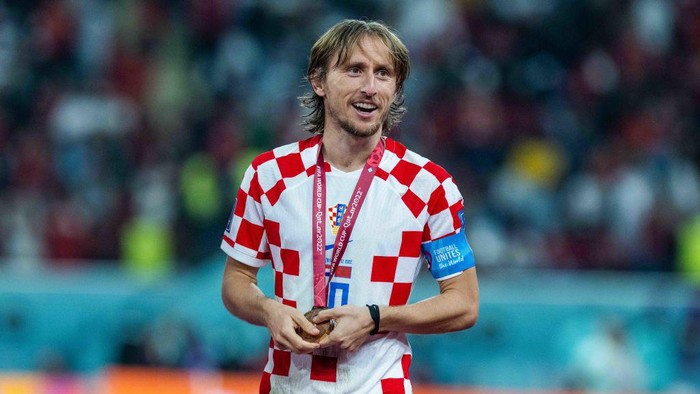 DOHA, QATAR - DECEMBER 17: Luka Modric of Croatia holds his bronze medal afterl the FIFA World Cup Qatar 2022 3rd Place match between Croatia and Morocco at Khalifa International Stadium on December 17, 2022 in Doha, Qatar. (Photo by Sebastian Frej/MB Media/Getty Images)